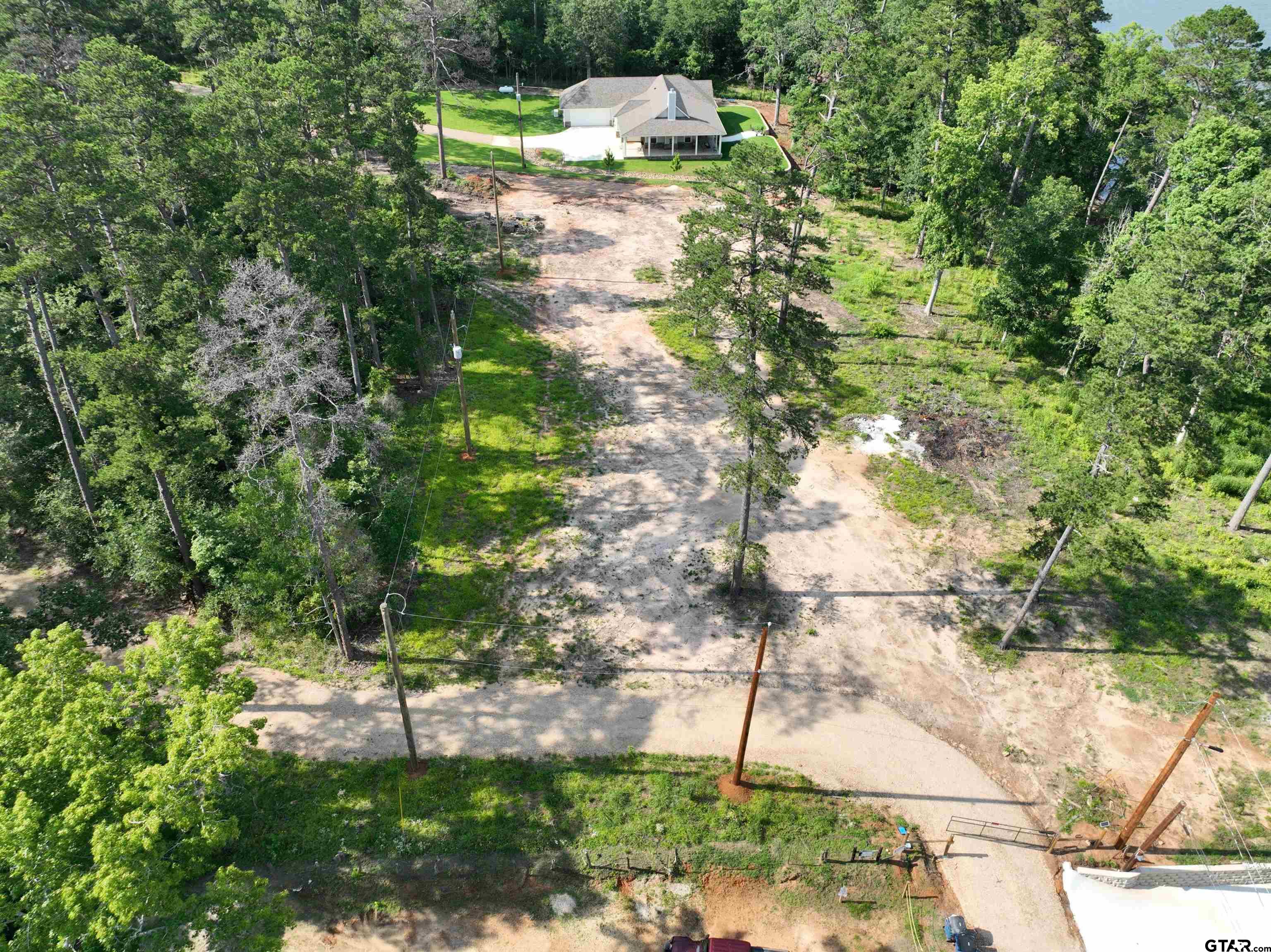 Tbd Pine Hills Road Gladewater, TX 75647 - Photo 7 of 10 a view of a house with a yard