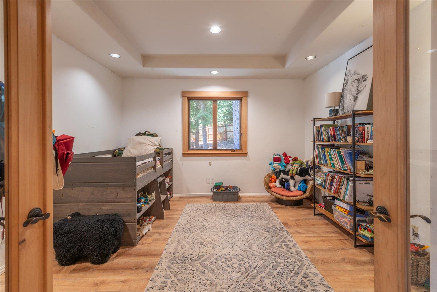 11013 Beacon Road Truckee, CA 96161 - Photo 18 of 20 a bedroom with furniture and a bed