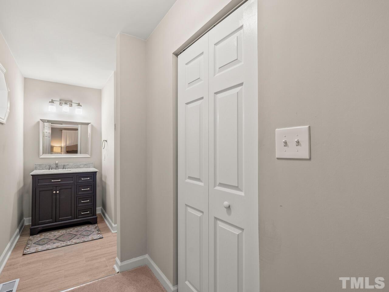 430 Obie Drive Durham, NC 27713 - Photo 18 of 35 a bathroom with a sink and a mirror
