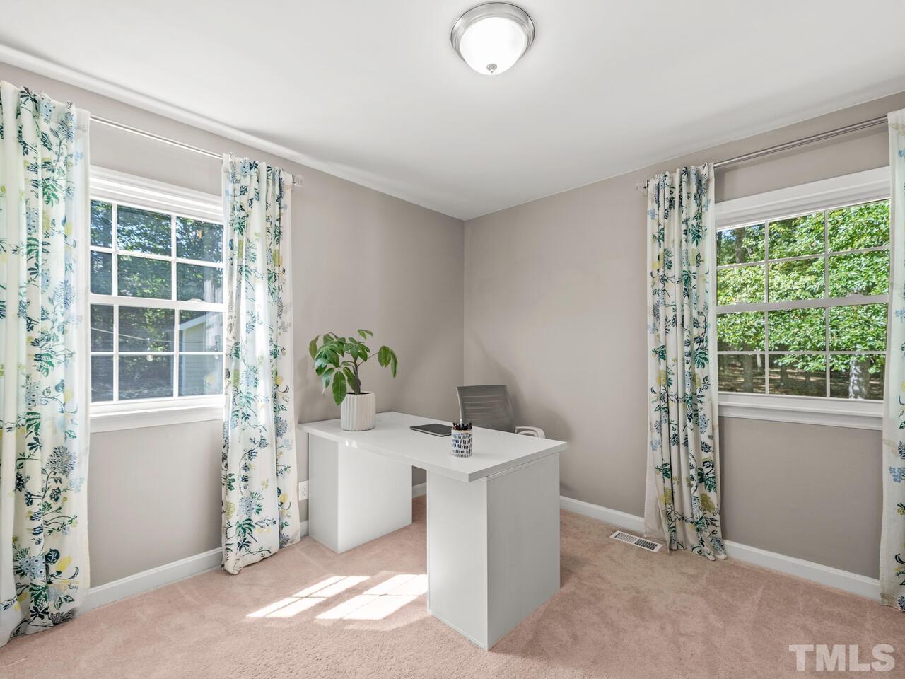 430 Obie Drive Durham, NC 27713 - Photo 20 of 35 a room with window and front door