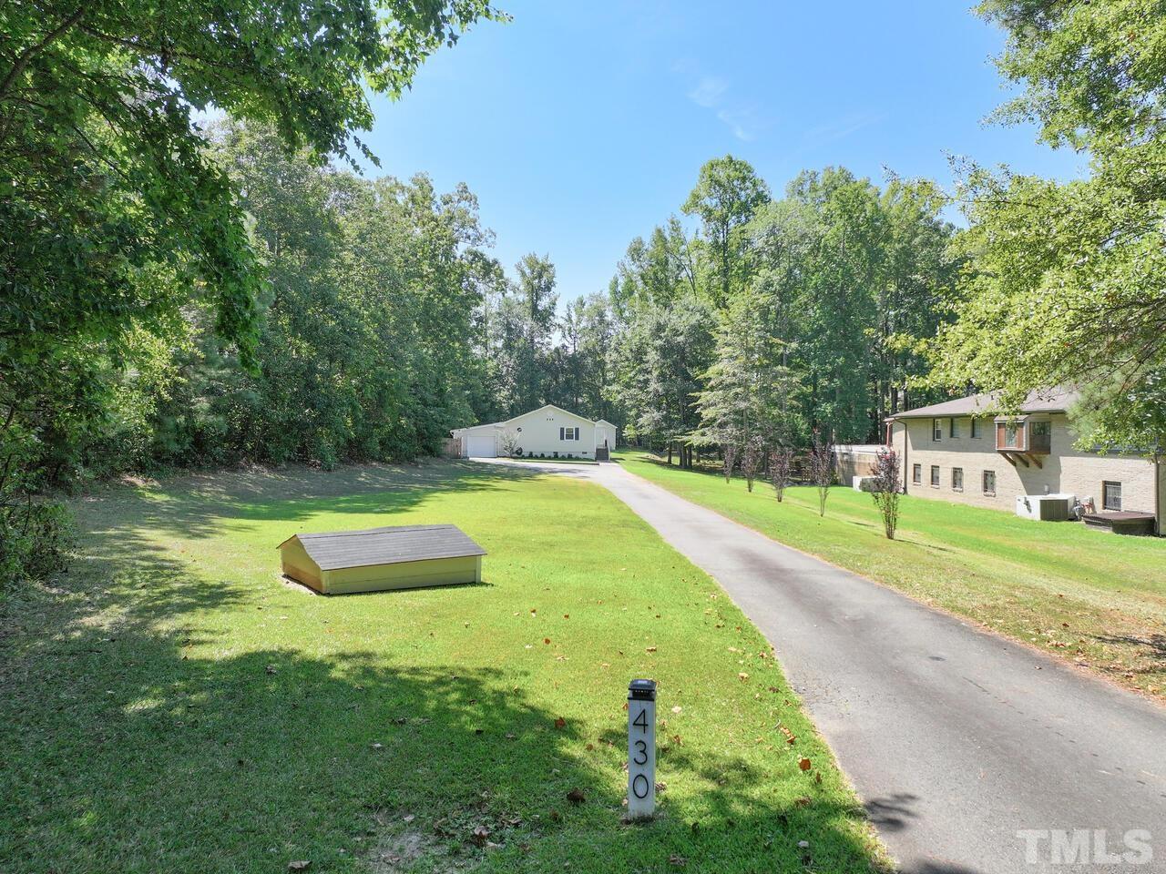 430 Obie Drive Durham, NC 27713 - Photo 25 of 35 a view of a swimming pool with a yard