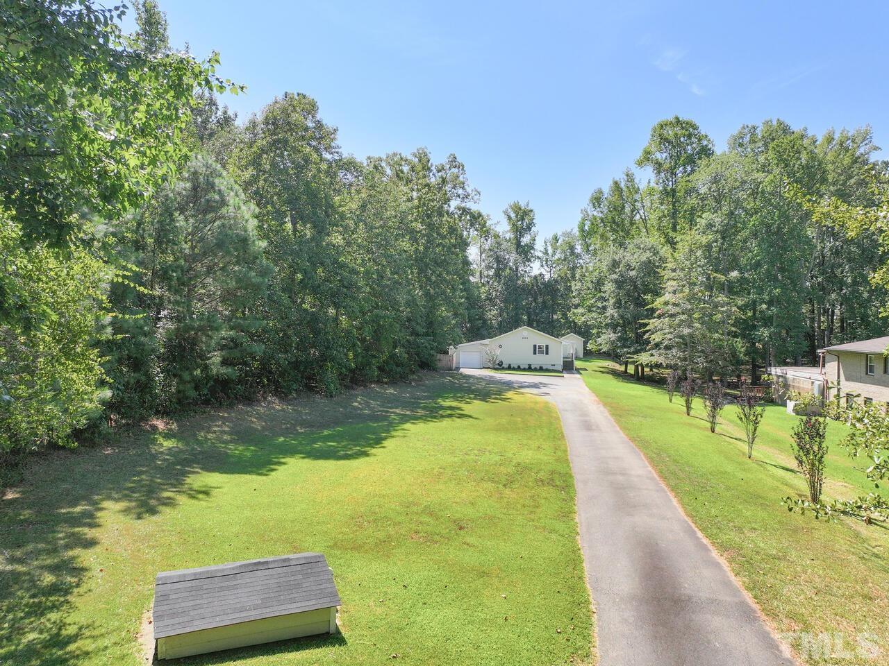 430 Obie Drive Durham, NC 27713 - Photo 26 of 35 a view of a swimming pool with a yard