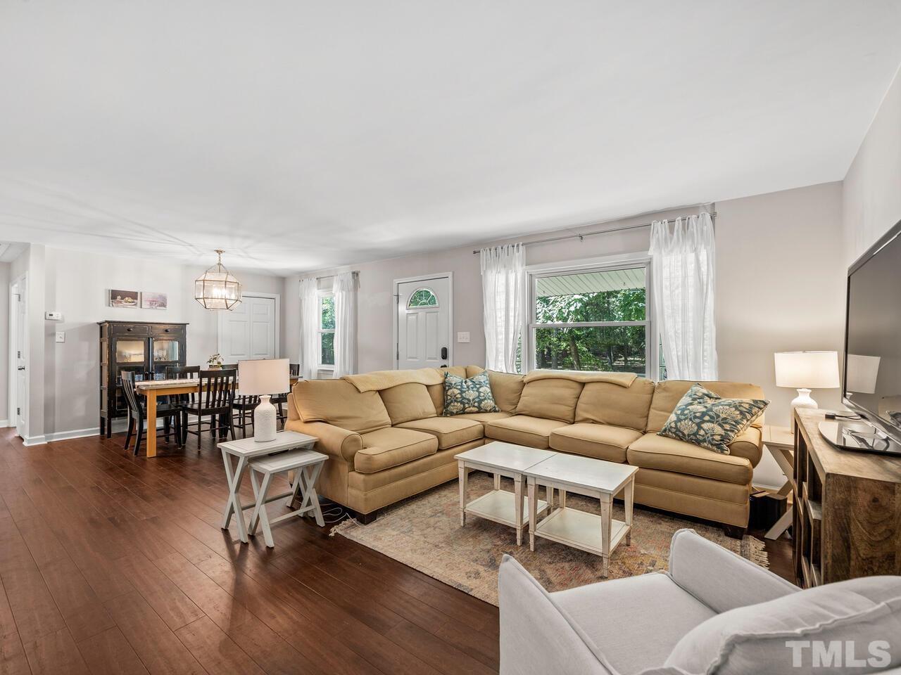 430 Obie Drive Durham, NC 27713 - Photo 8 of 35 a living room with furniture and a large window