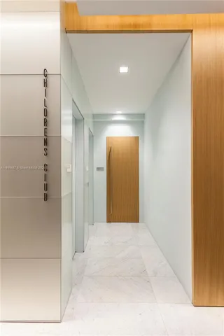 a view of a big room with closet and windows