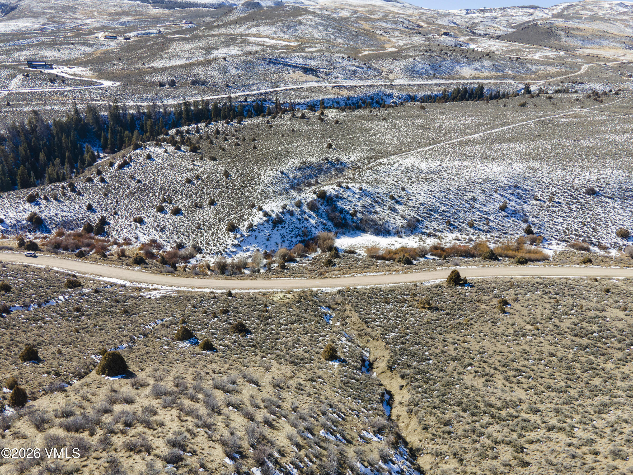 1697 Elk Ridge Road Wolcott, CO 81655 - Photo 26 of 37 a view of a lake with beach