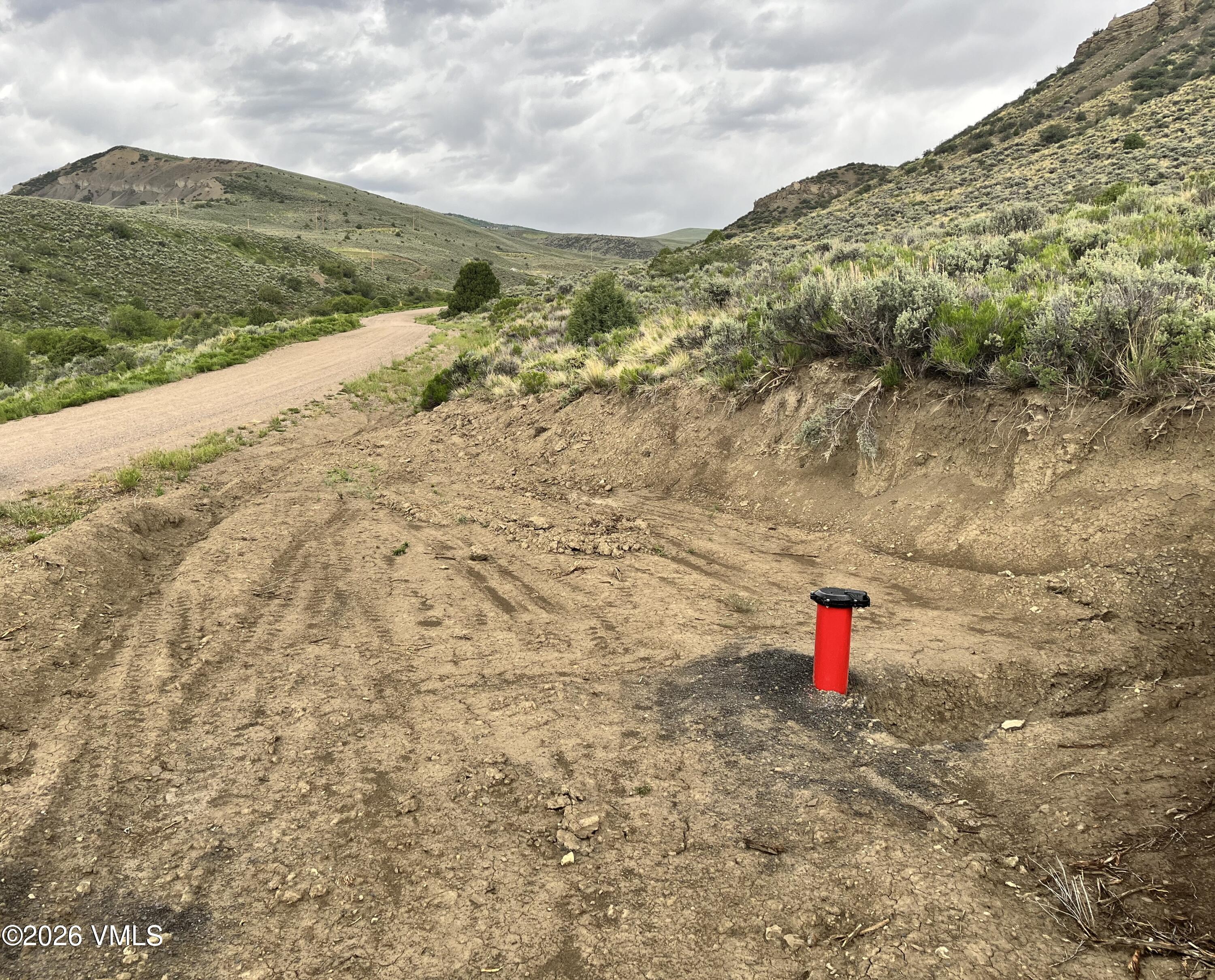 1697 Elk Ridge Road Wolcott, CO 81655 - Photo 9 of 37 a view of a field with mountains in the background