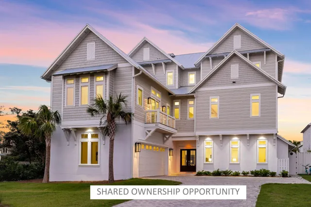 a view of a balcony with wooden floor and city view