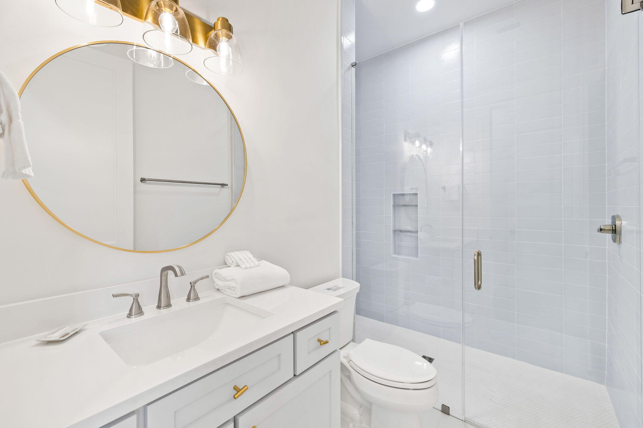 311 Walton Rose Ln Inlet Beach Inlet Beach, FL 32461 - Photo 39 of 90 a bathroom with a sink a toilet and a mirror