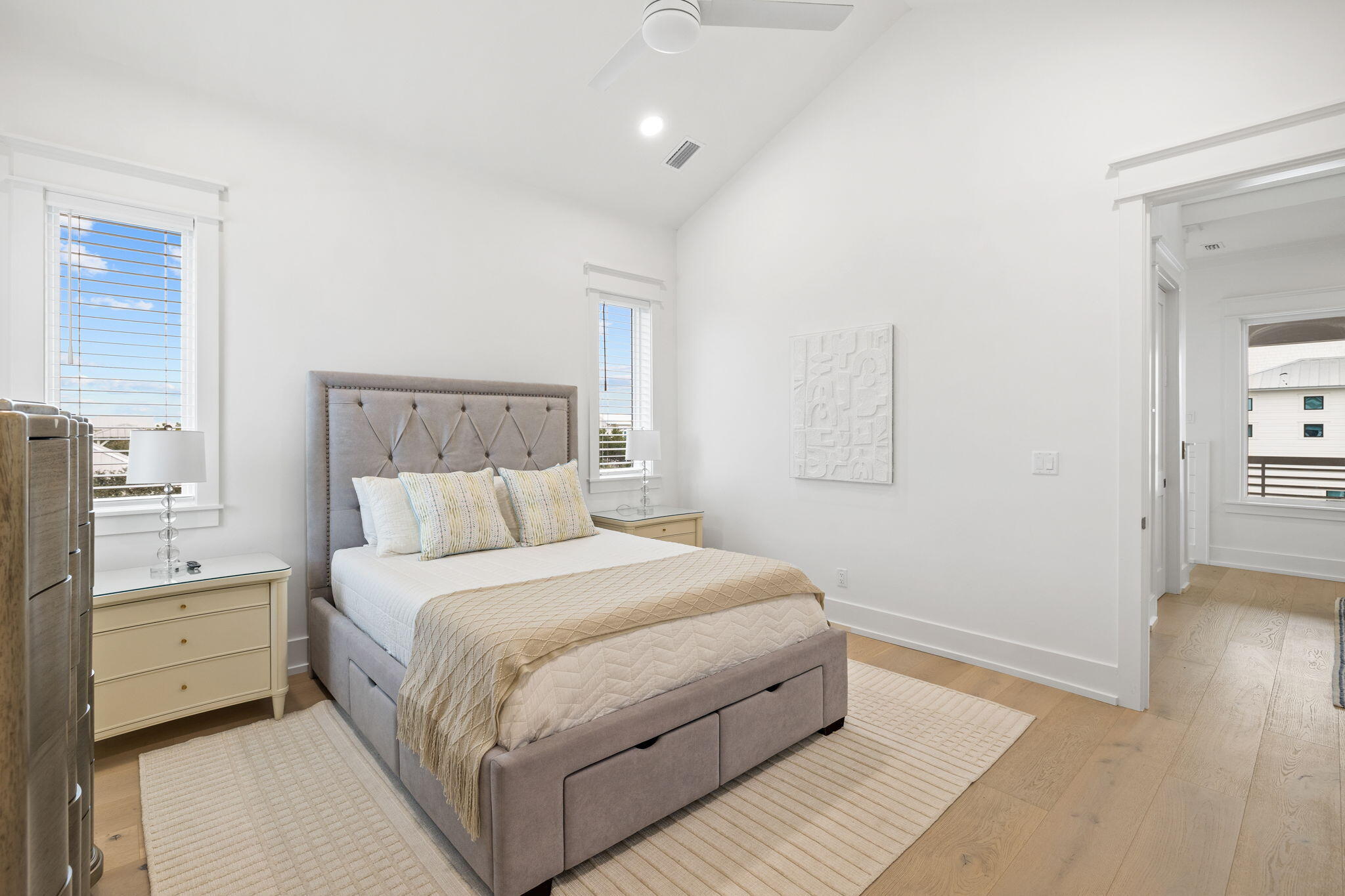 311 Walton Rose Ln Inlet Beach Inlet Beach, FL 32461 - Photo 50 of 90 a bedroom with a bed and wooden floor