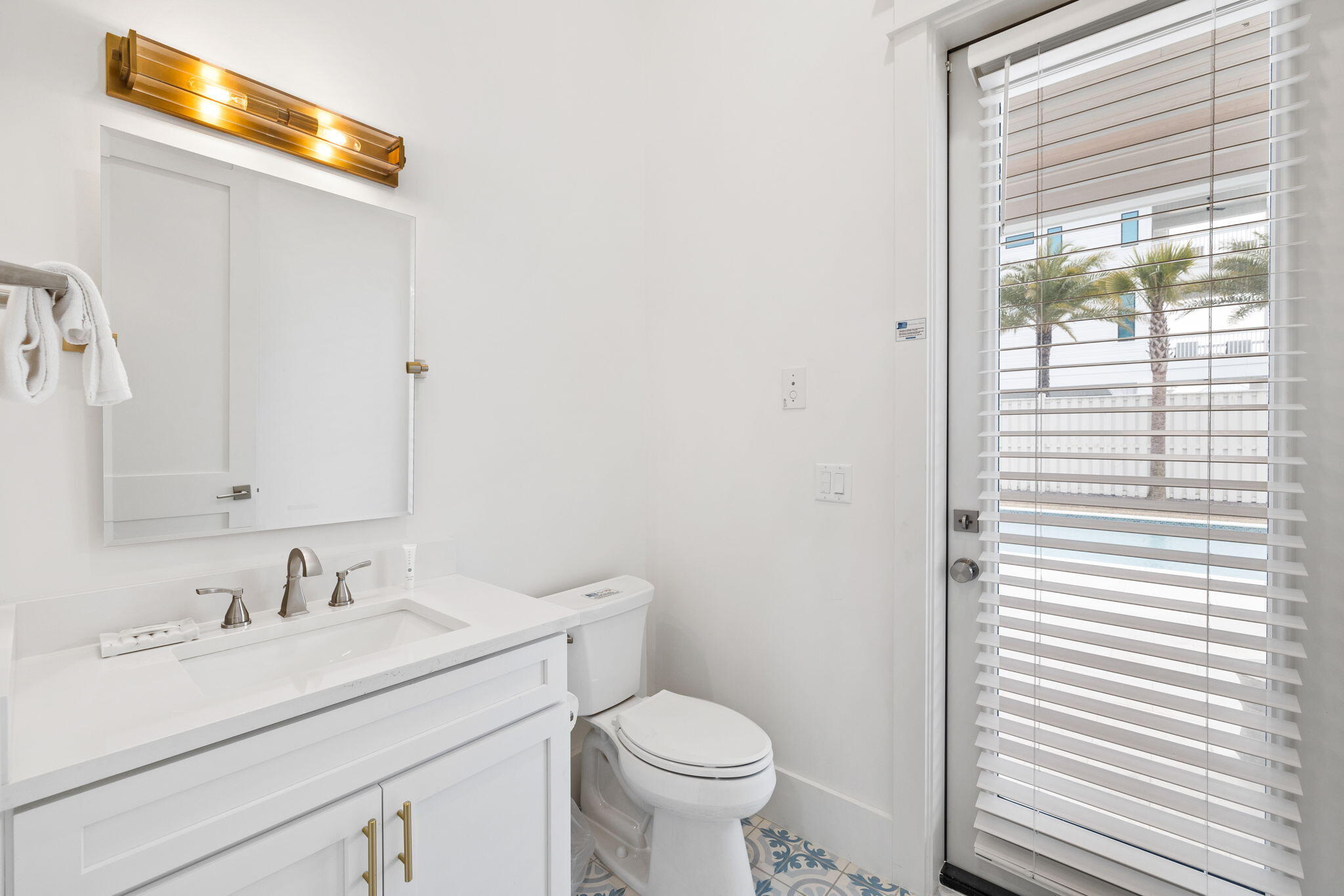 311 Walton Rose Ln Inlet Beach Inlet Beach, FL 32461 - Photo 53 of 90 a bathroom with a sink and a toilet