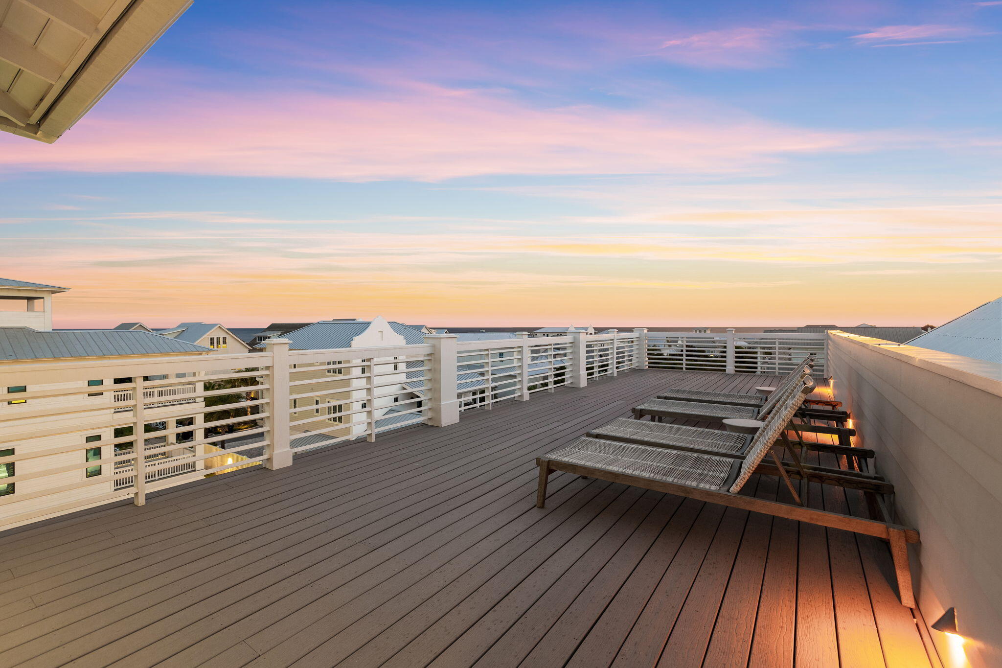 311 Walton Rose Ln Inlet Beach Inlet Beach, FL 32461 - Photo 6 of 90 a view of a balcony with wooden floor and city view