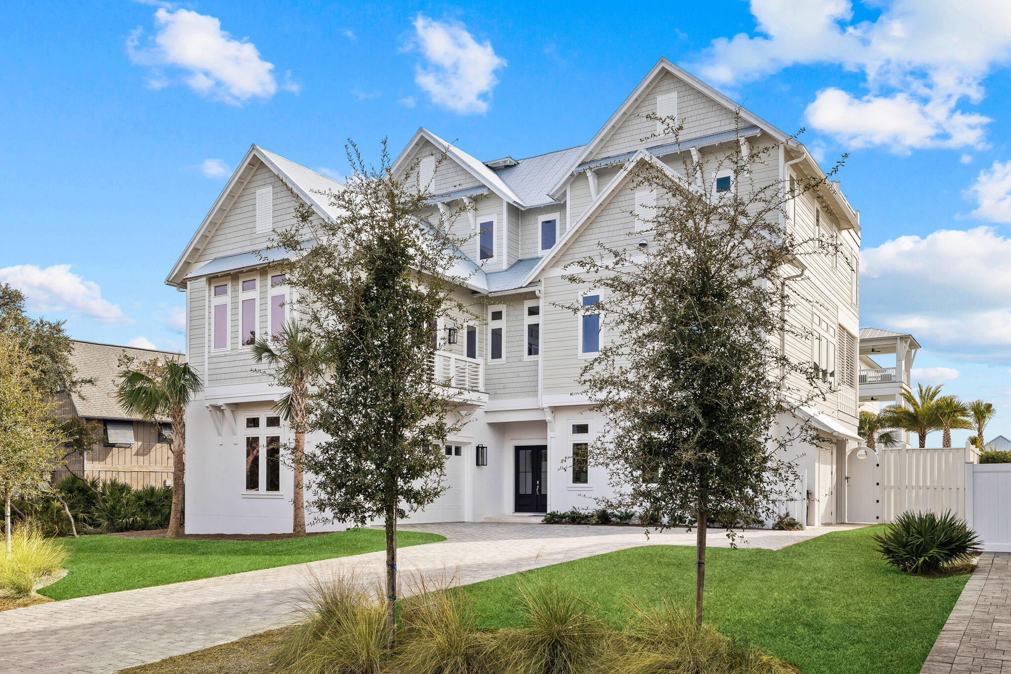 311 Walton Rose Ln Inlet Beach Inlet Beach, FL 32461 - Photo 84 of 90 a front view of a residential houses with yard and green space