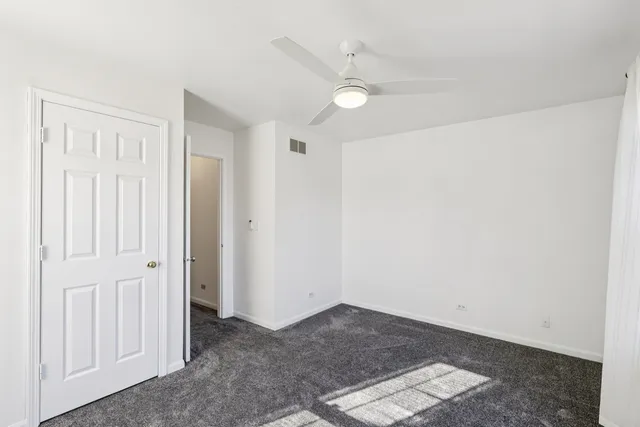 a bathroom with a sink vanity and mirror