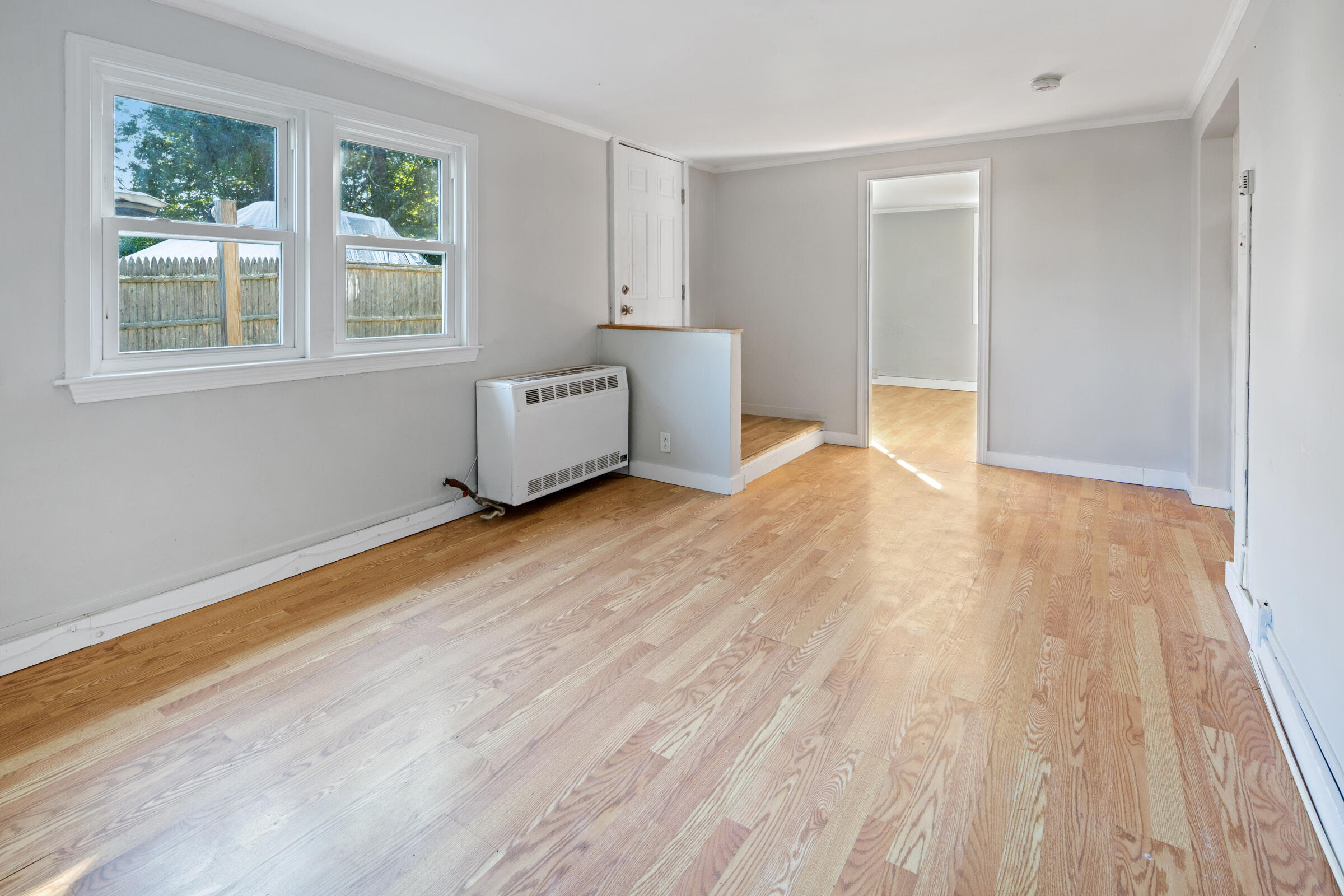15 Bee Lane Centerville, MA 02632 - Photo 3 of 11 a view of a room with wooden floor and windows