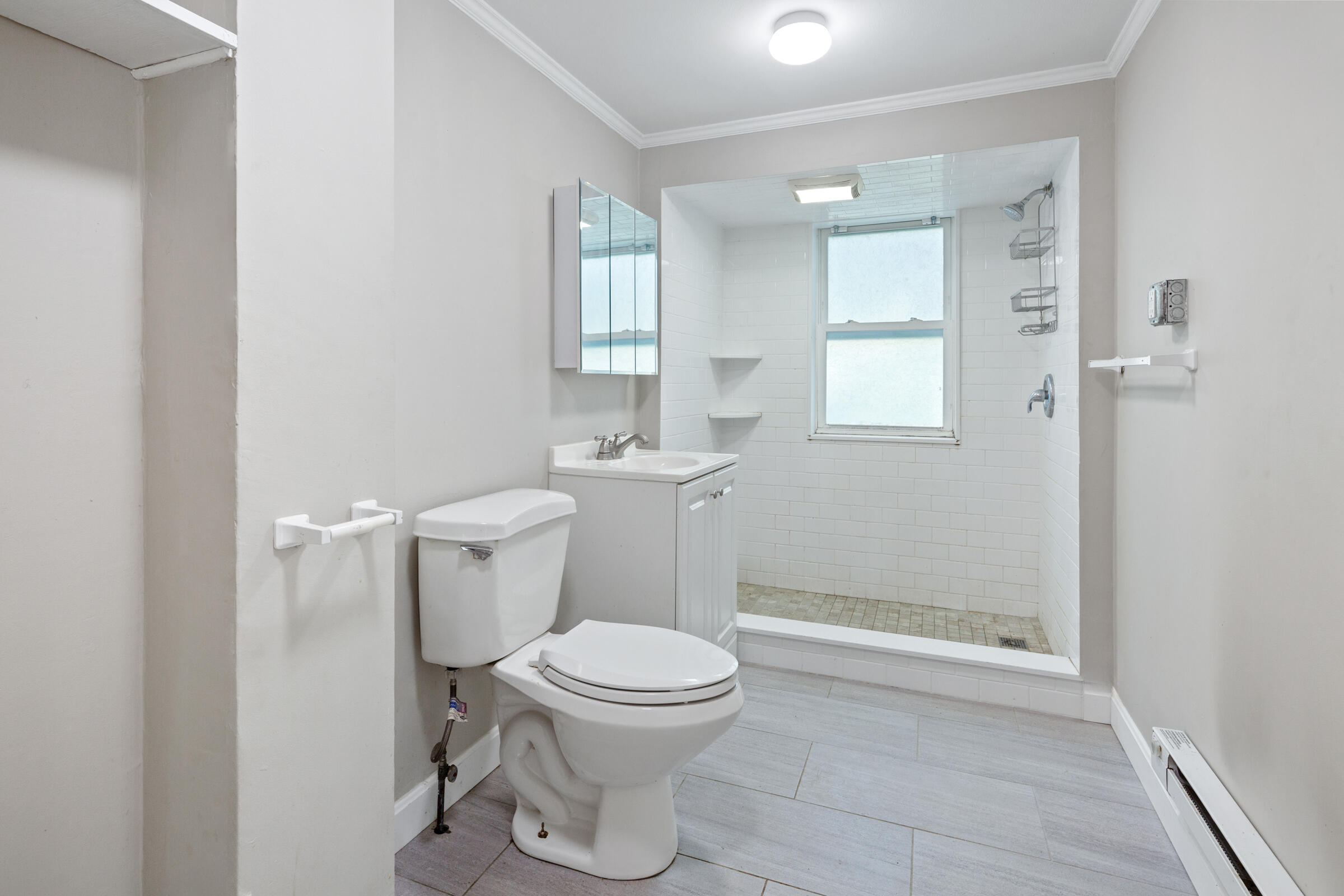 15 Bee Lane Centerville, MA 02632 - Photo 10 of 11 a bathroom with a toilet and a shower