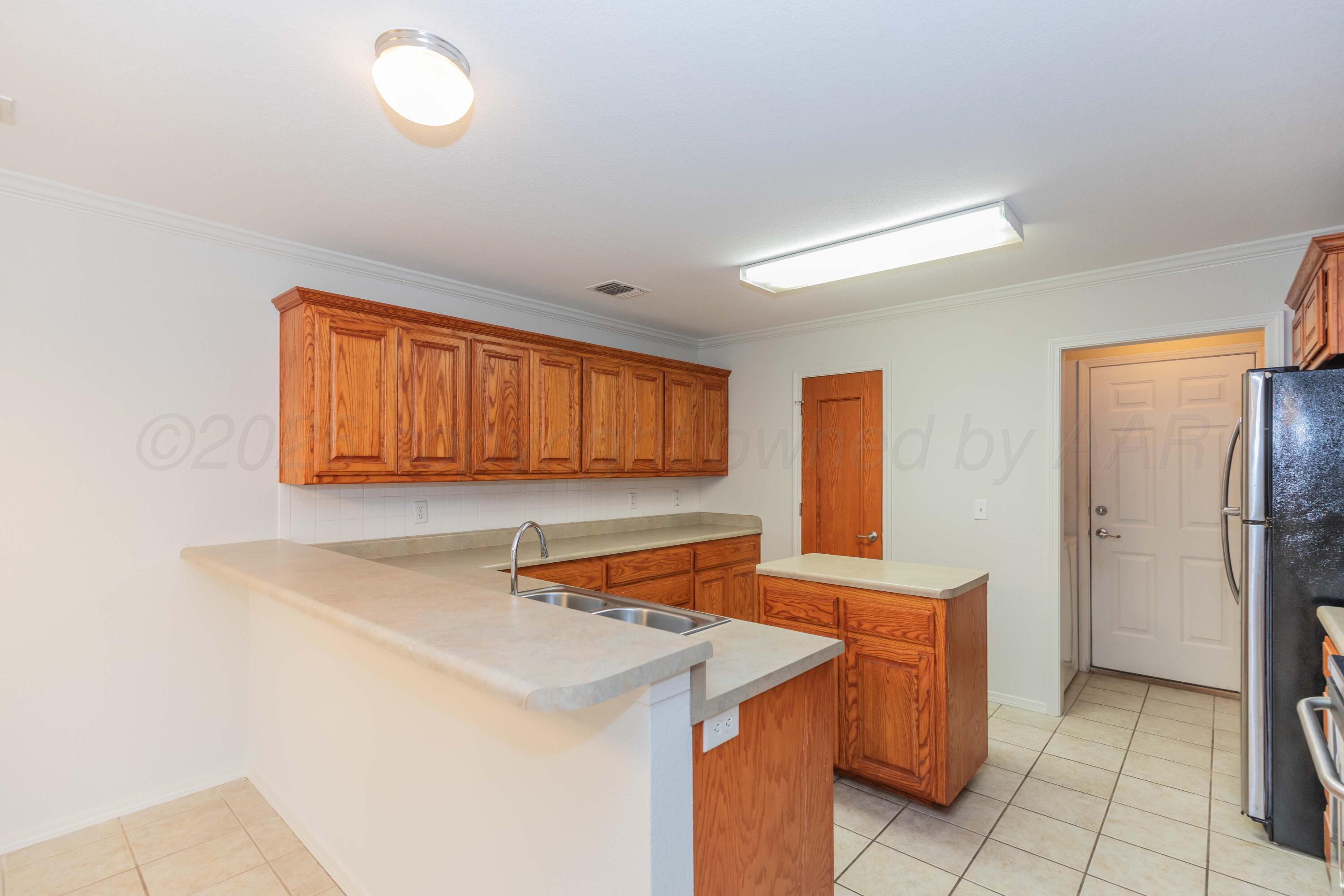 4517 Steffi Court Amarillo, TX 79110 - Photo 13 of 29 KITCHEN VIEW 1