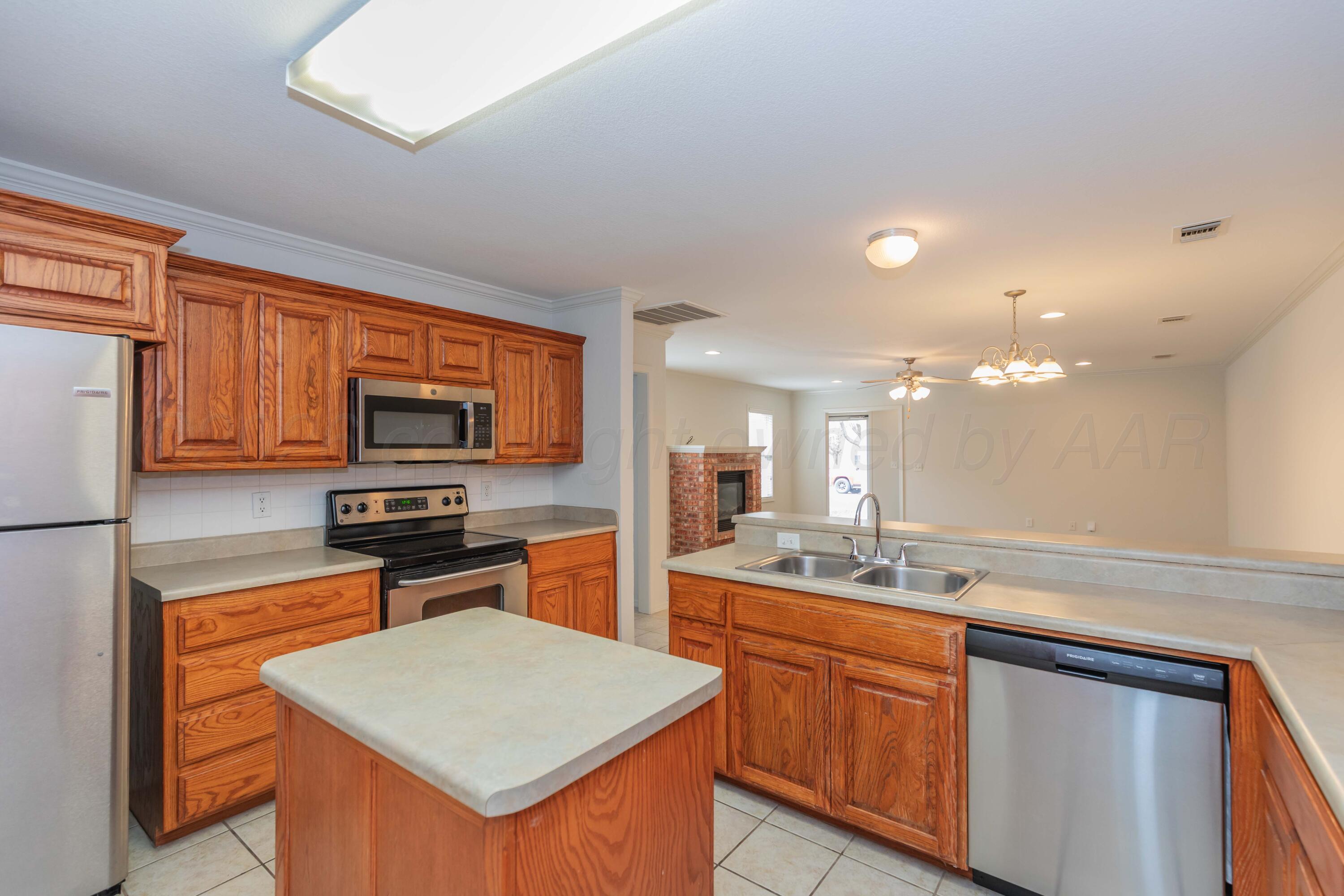 4517 Steffi Court Amarillo, TX 79110 - Photo 14 of 29 KITCHEN VIEW 2