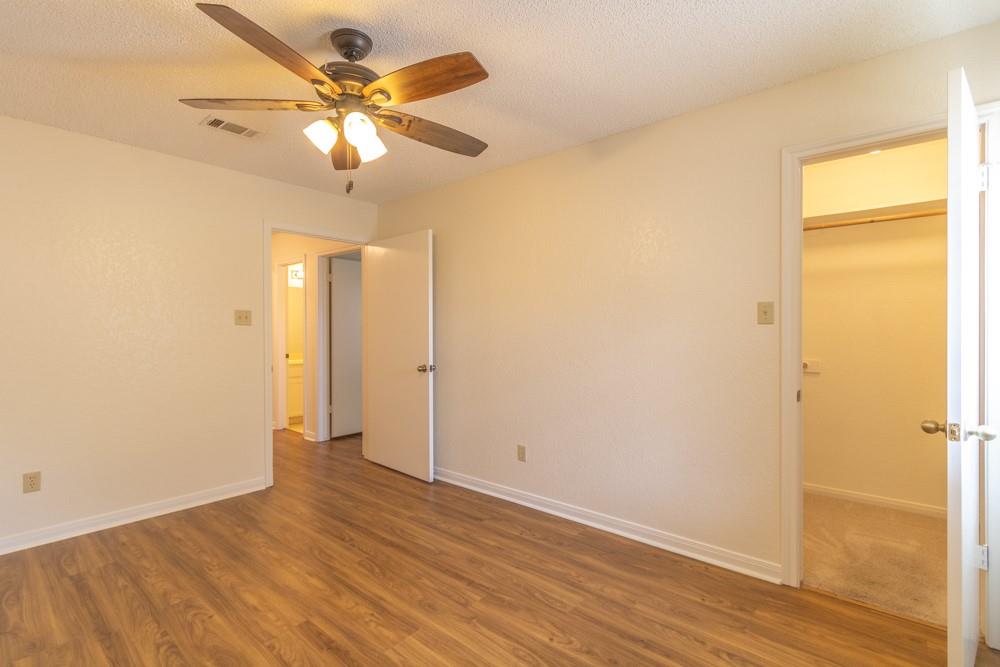 2411 Raintree Path Round Rock, TX 78664 - Photo 20 of 28 wooden floor in an empty room