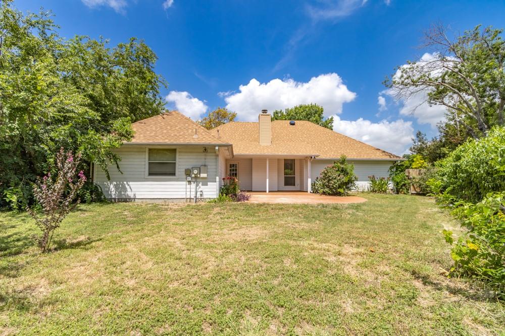 2411 Raintree Path Round Rock, TX 78664 - Photo 25 of 28 a front view of a house with a garden