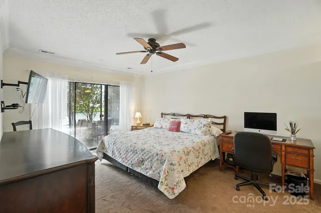 a bedroom with a bed and furniture