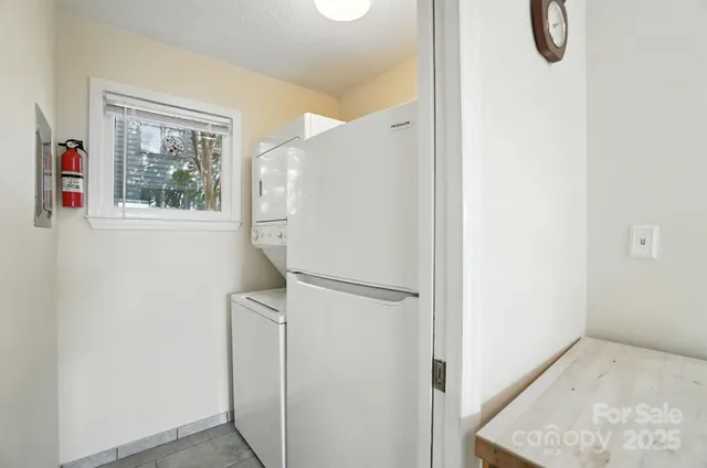 a view of walk in closet with window