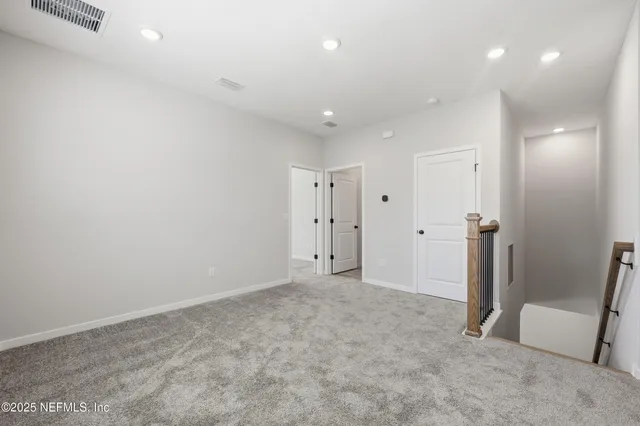 an empty room with an entryway