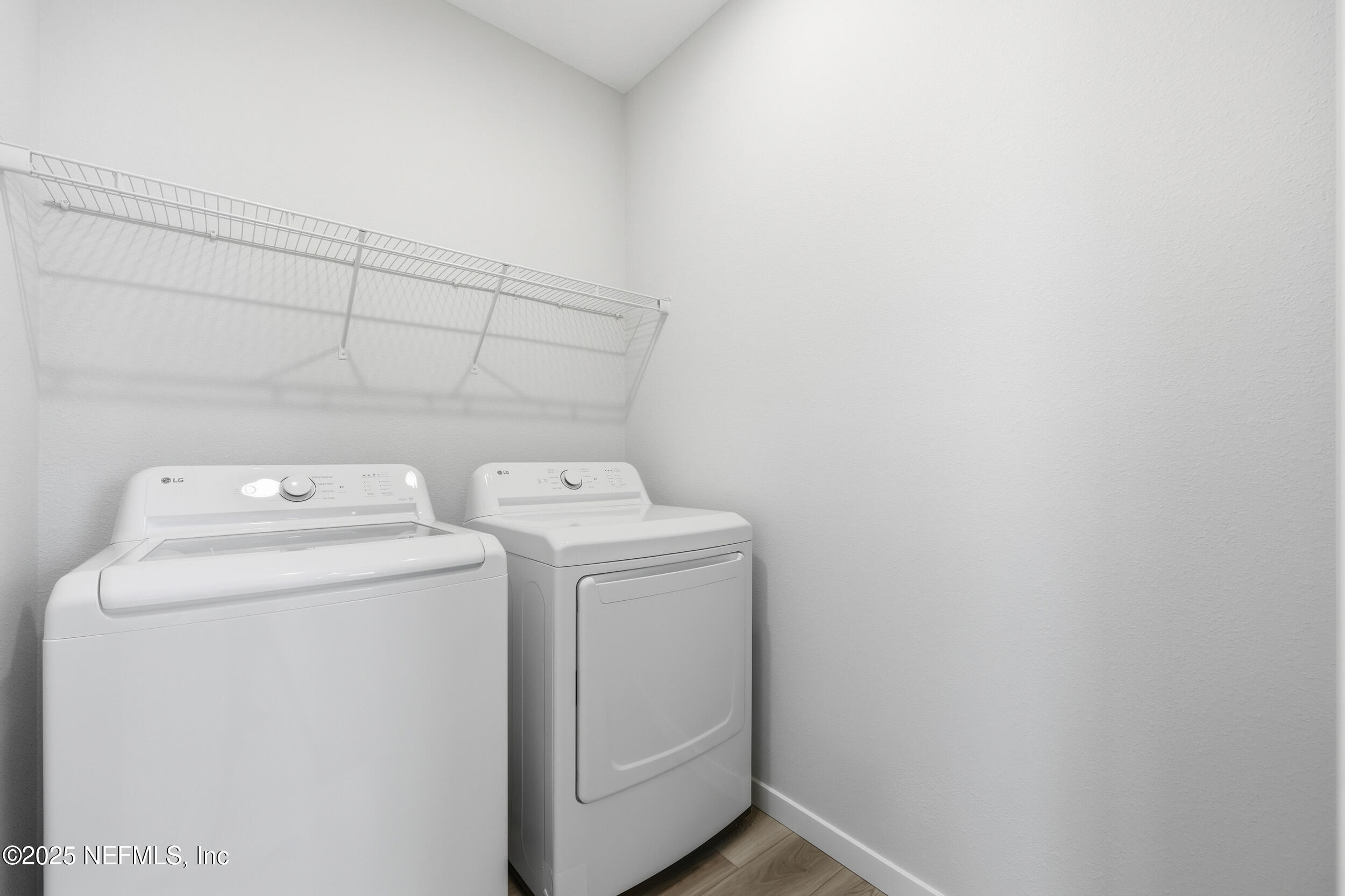 96509 Stillpoint Way Fernandina Beach, FL 32034 - Photo 20 of 32 a utility room with dryer and washer