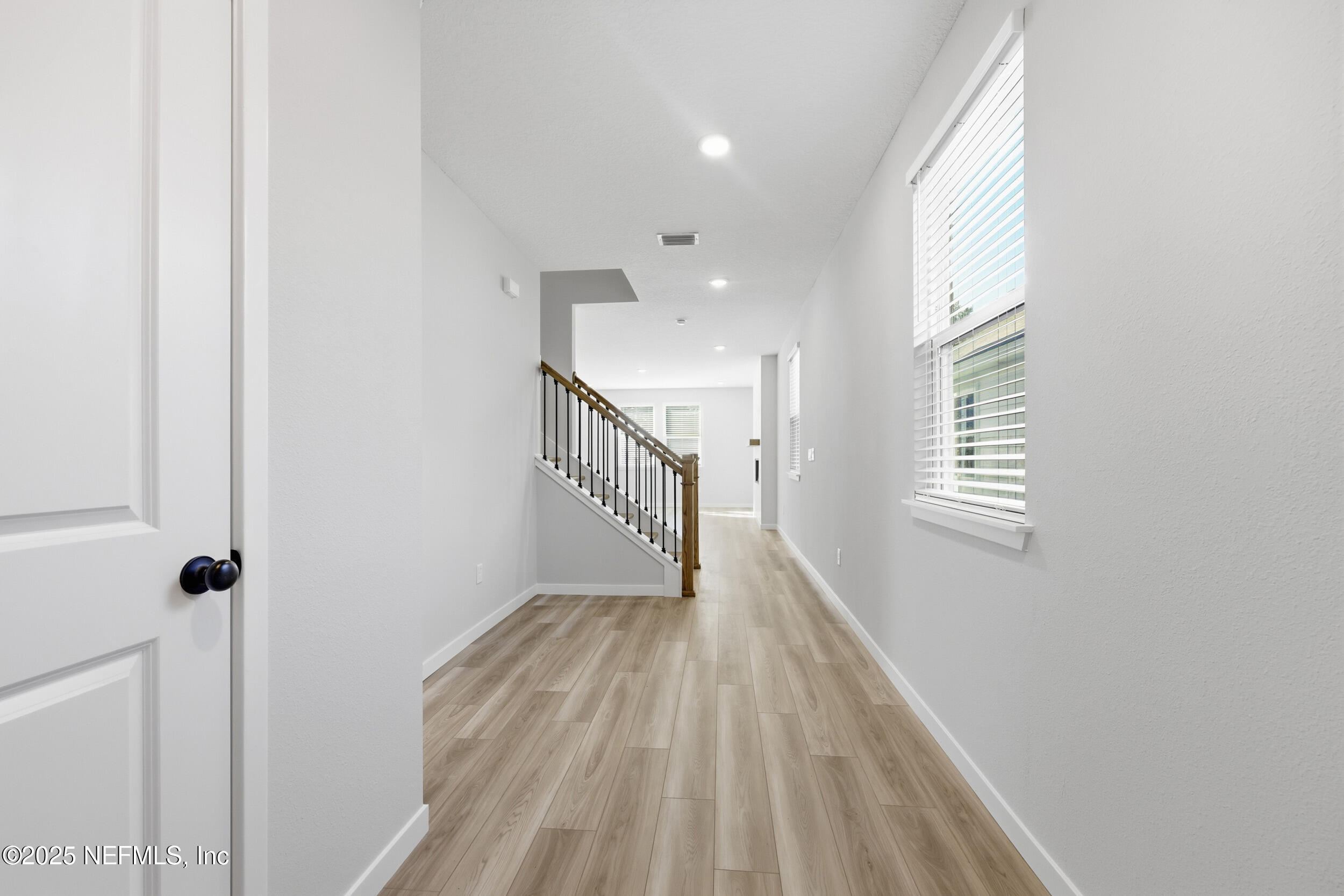 96509 Stillpoint Way Fernandina Beach, FL 32034 - Photo 4 of 32 a view of hallway with stairs