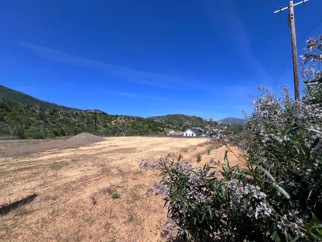 a view of mountain with lake view