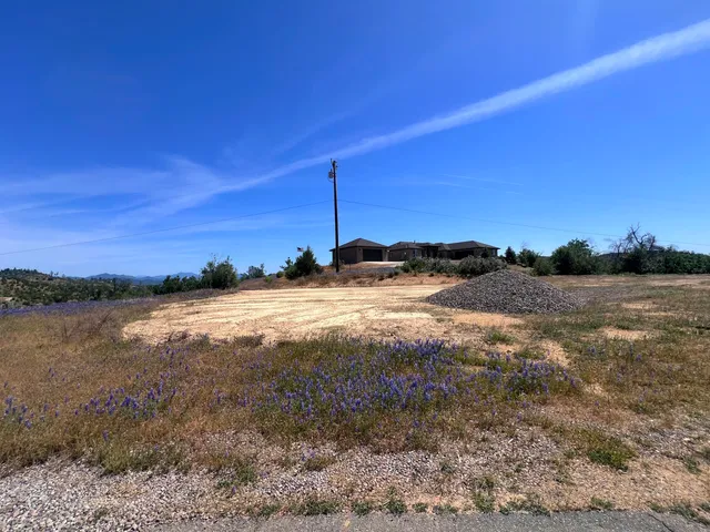 a view of lake with sunset