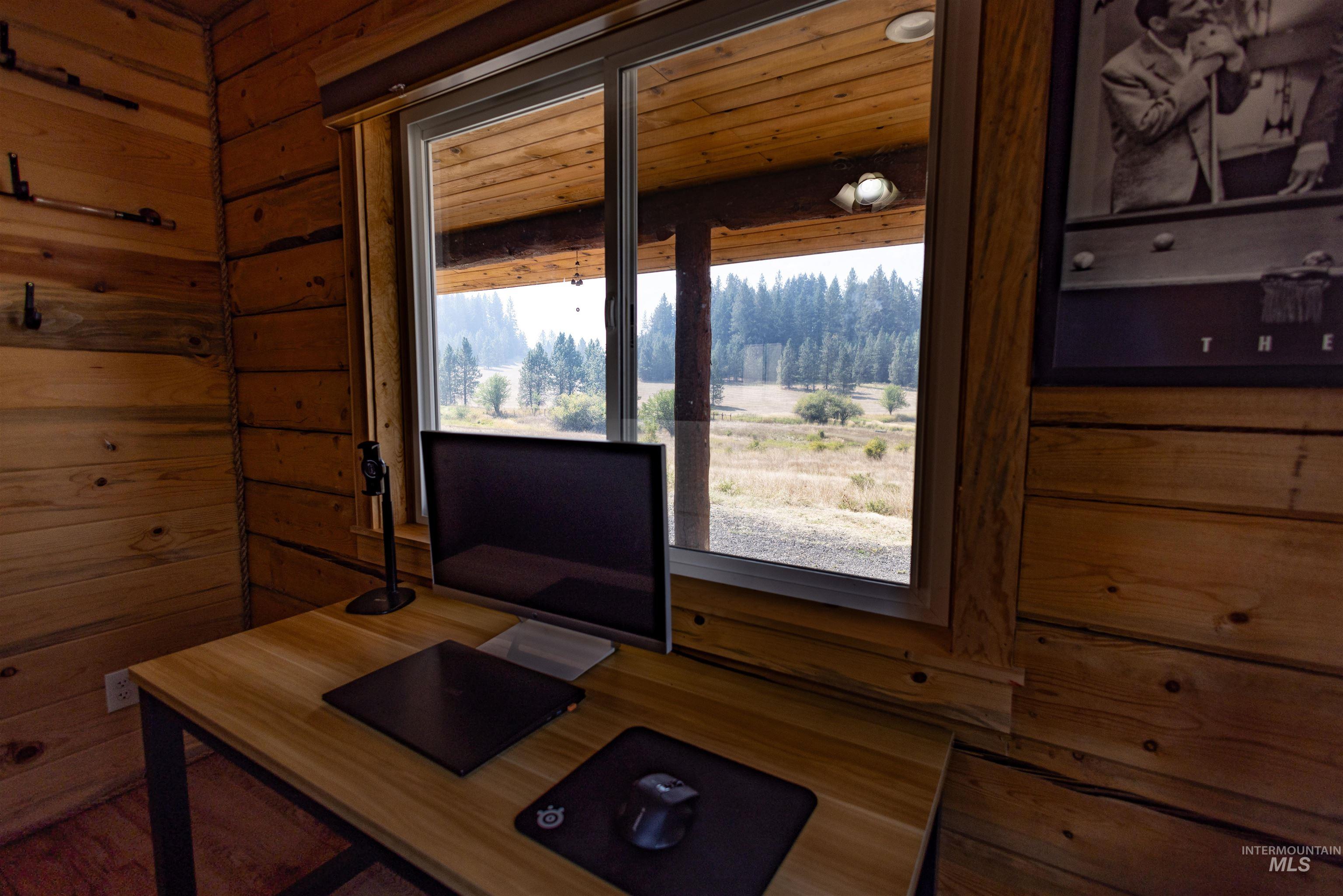 830 Leitch Creek Road Kooskia, ID 83539 - Photo 22 of 49 Office space featuring wood walls and wood finished floors