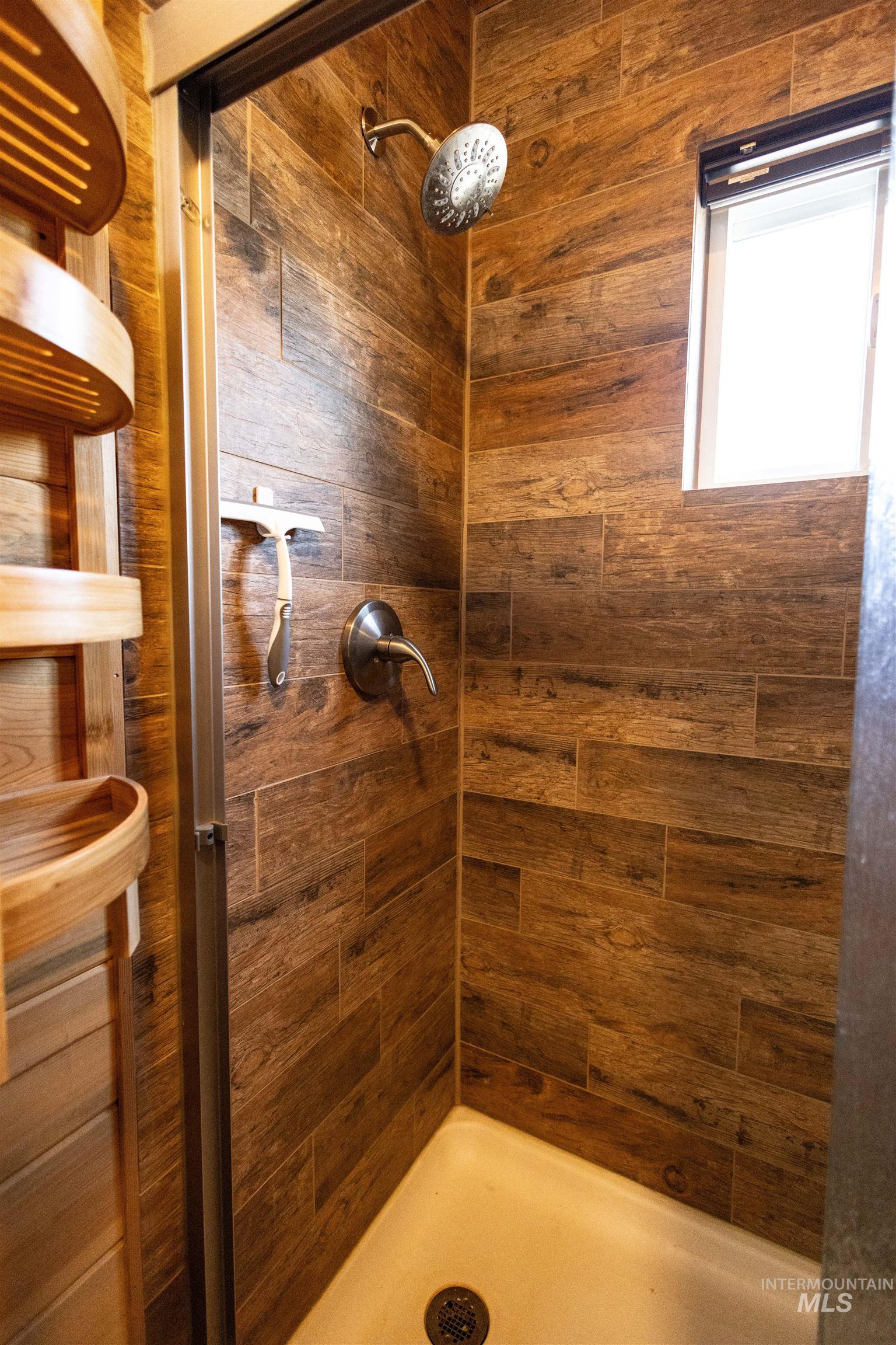 830 Leitch Creek Road Kooskia, ID 83539 - Photo 23 of 49 Bathroom featuring a stall shower