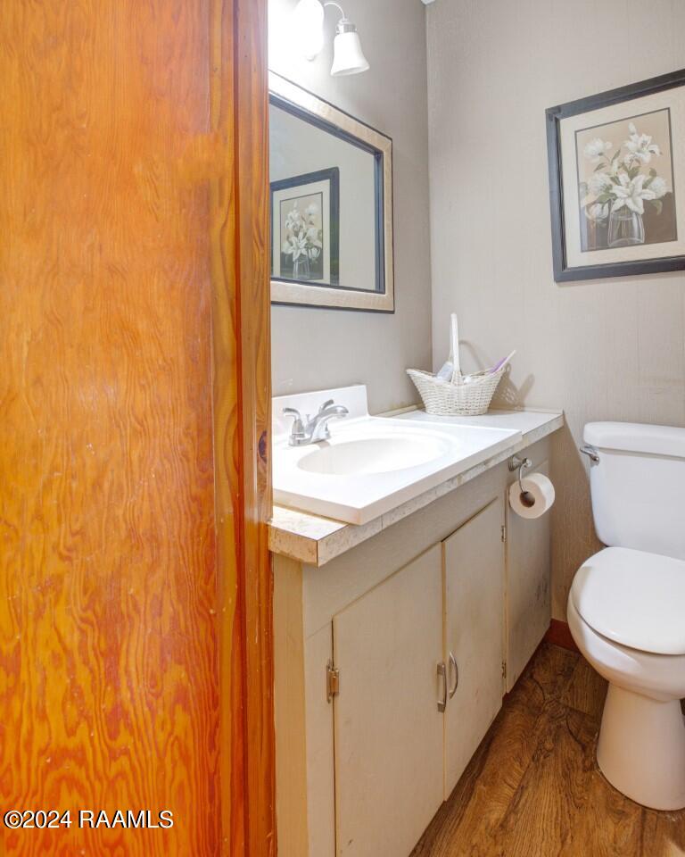 538 Kennerson Road Opelousas, LA 70570 - Photo 15 of 25 Half bath next to primary BR
