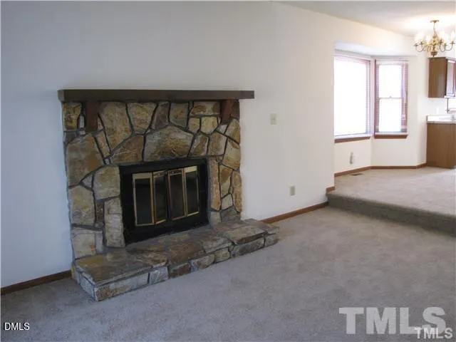 a living room with a fireplace