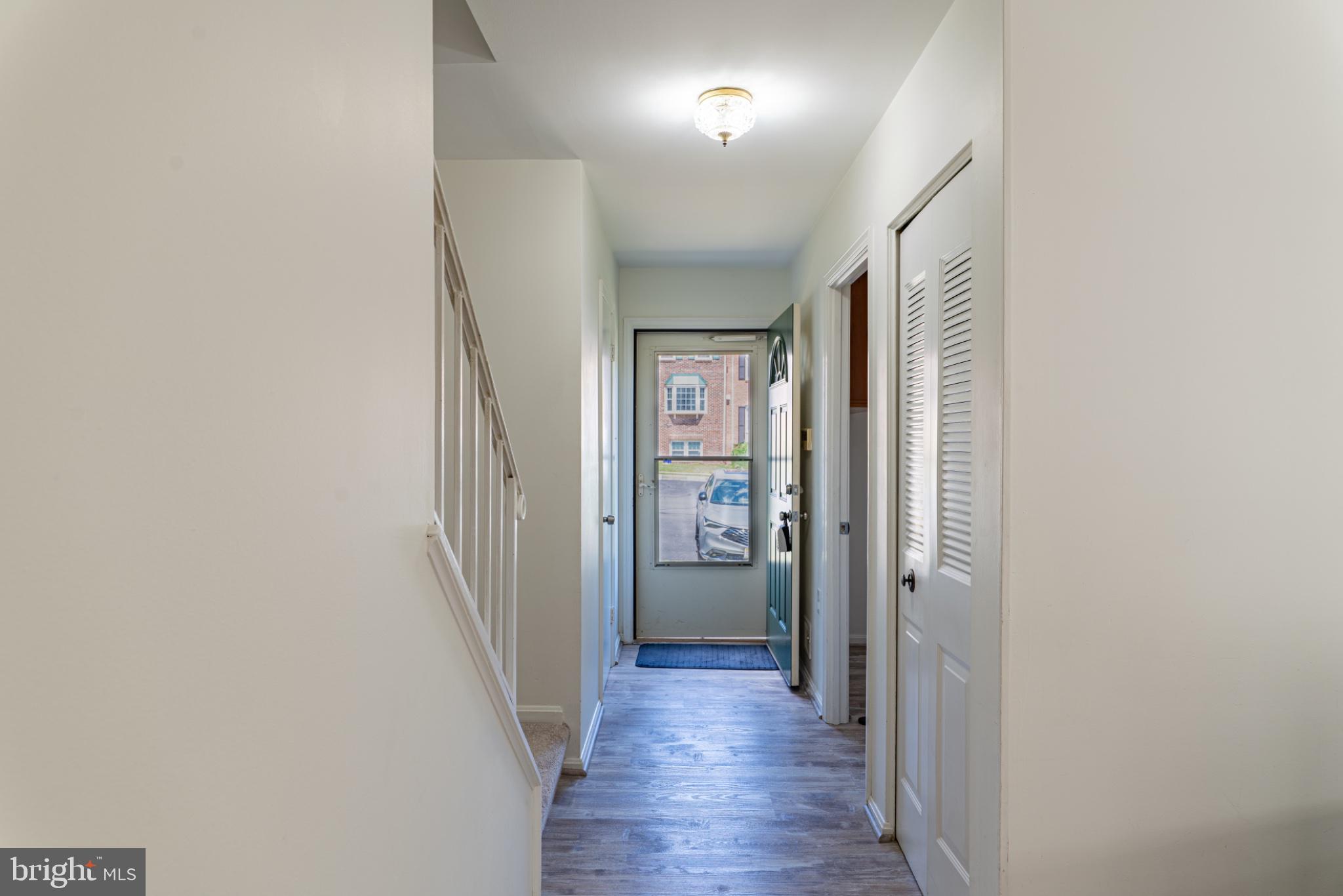 2913 Seminole Road Woodbridge, VA 22192 - Photo 5 of 34 a view of a hallway with wooden floor