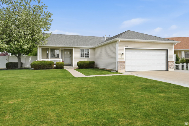 2190 West 1450th Street North Layton, UT 84041 - Photo 1 of 11 Ranch-style exterior with beige siding and a gray shingle roof