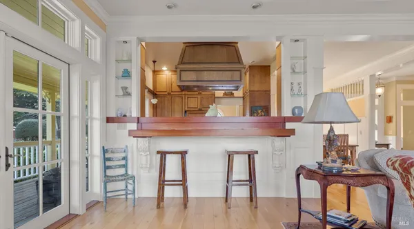 a kitchen with a stove and a refrigerator