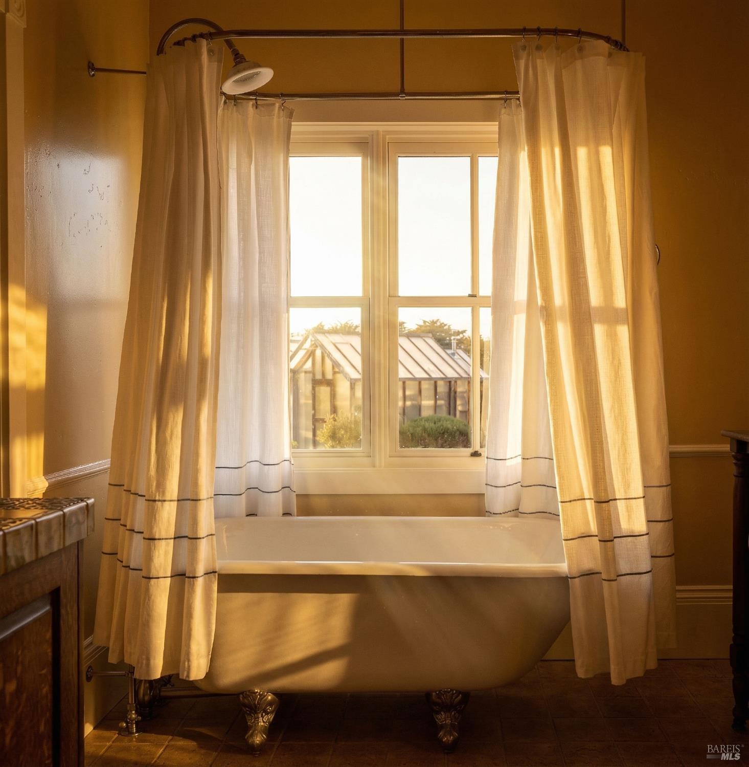 43700 Mountain View Road Manchester, CA 95459 - Photo 29 of 74 The House bath, connected to the secondary bedroom as well as the main living space, offers a beautiful claw foot tub for an elegant comfortable bath experience.