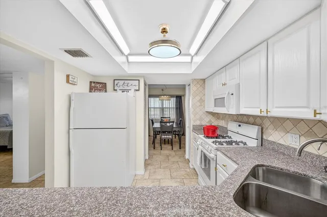 a view of balcony with potted plant