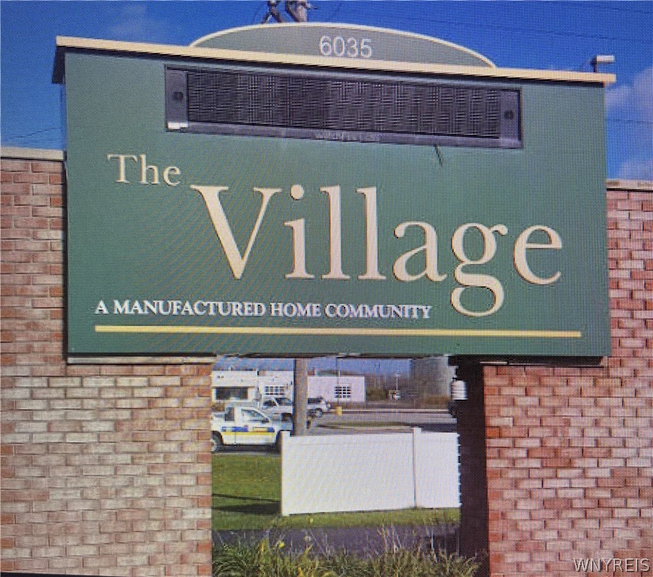 6035-286 South Transit Road, Unit 286 Lockport, NY 14094 - Photo 45 of 48 6035 S TRANSIT
BY WHITE VINYL FENCE