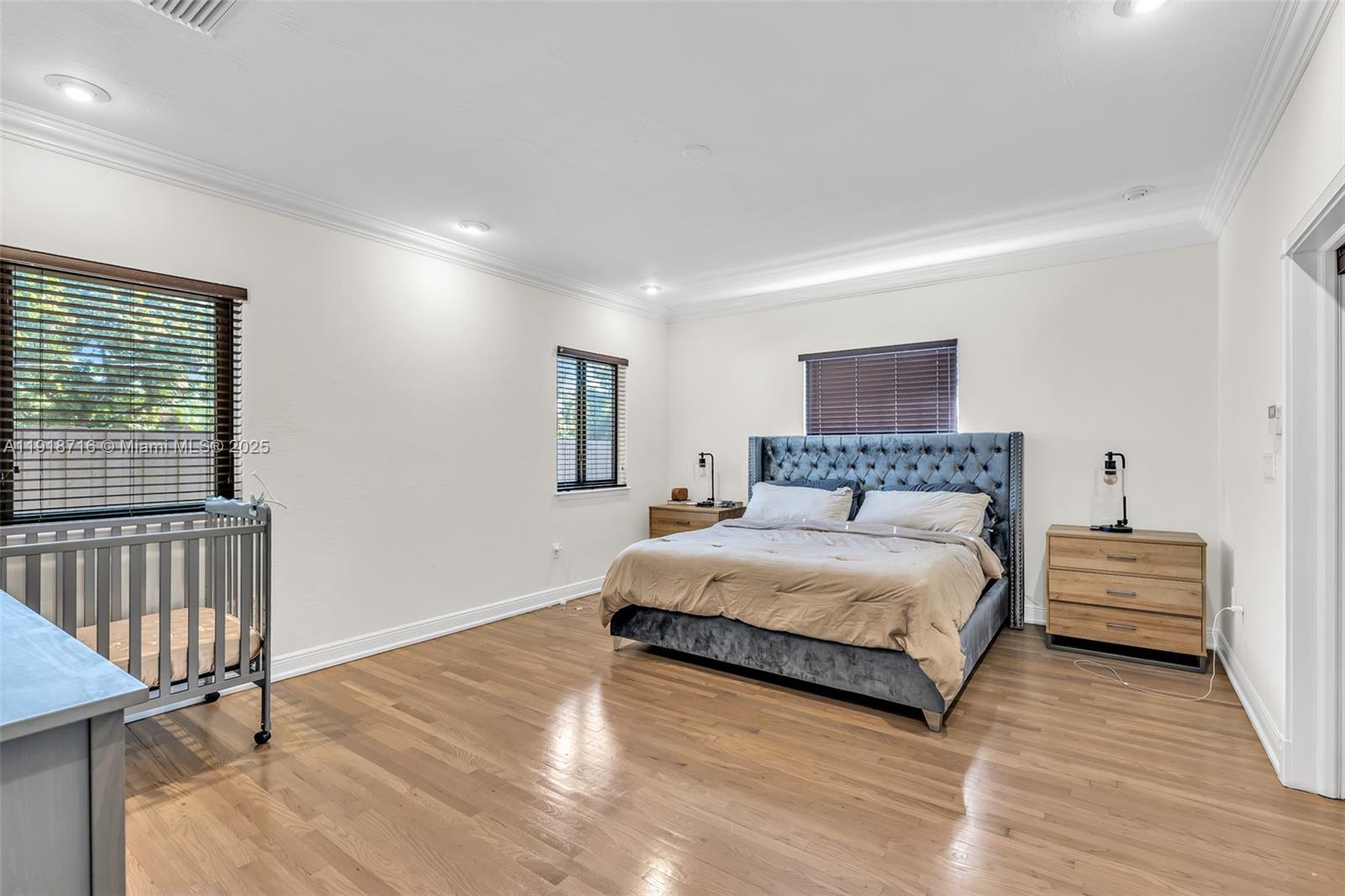 6376 Southwest 15th Street, Unit 6376 West Miami, FL 33155 - Photo 11 of 23 a spacious bedroom with a bed and a window