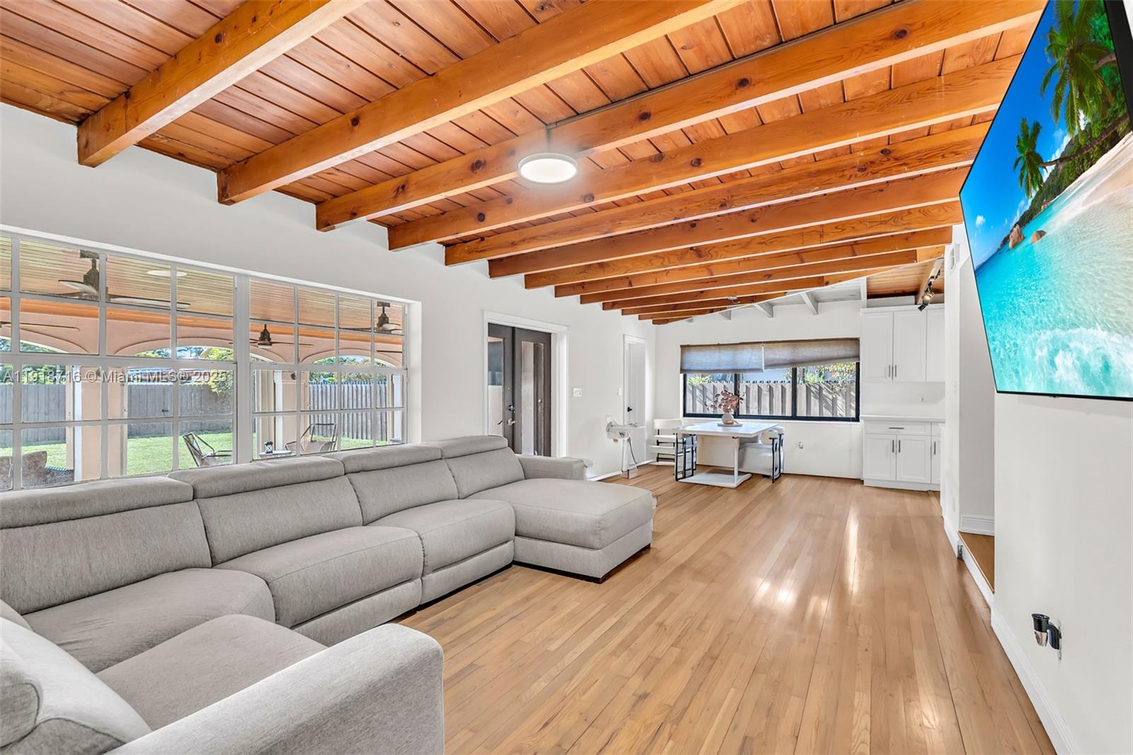 6376 Southwest 15th Street, Unit 6376 West Miami, FL 33155 - Photo 14 of 23 a living room with furniture