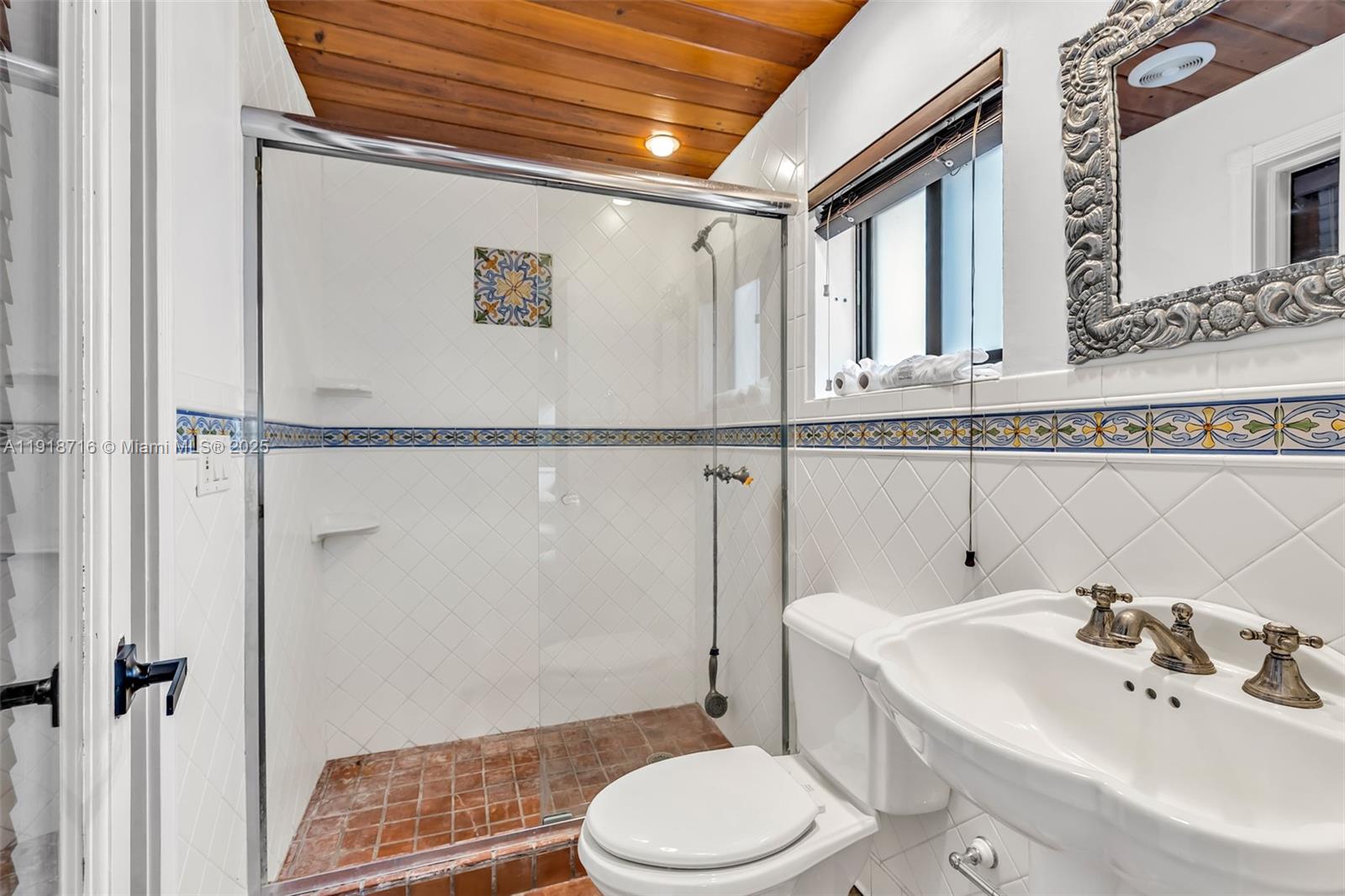 6376 Southwest 15th Street, Unit 6376 West Miami, FL 33155 - Photo 16 of 23 a bathroom with a sink toilet and shower