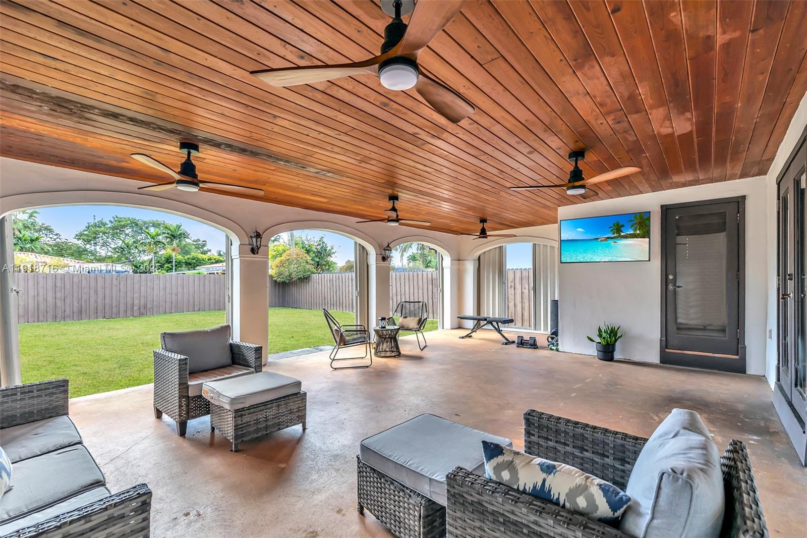 6376 Southwest 15th Street, Unit 6376 West Miami, FL 33155 - Photo 20 of 23 a patio with patio table and chairs