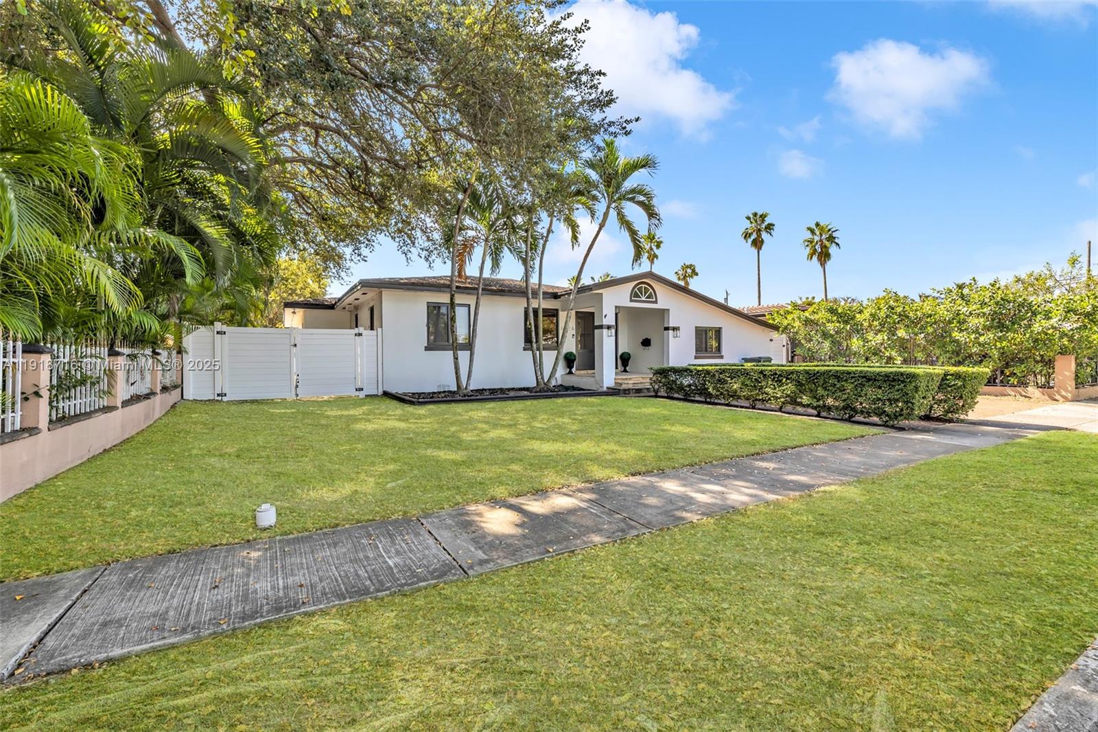 6376 Southwest 15th Street, Unit 6376 West Miami, FL 33155 - Photo 2 of 23 a house view with a garden space
