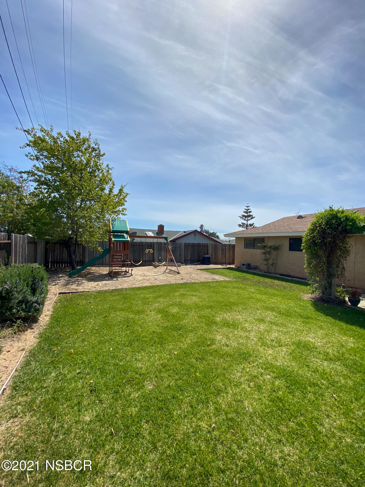 3941 Spica Way Lompoc, CA 93436 - Photo 12 of 24 a view of a house with a big yard