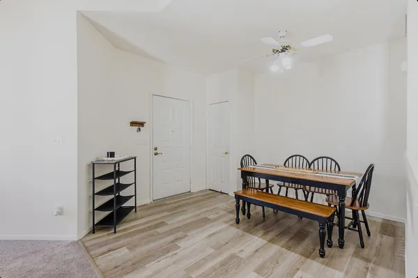 a room with furniture and wooden floor