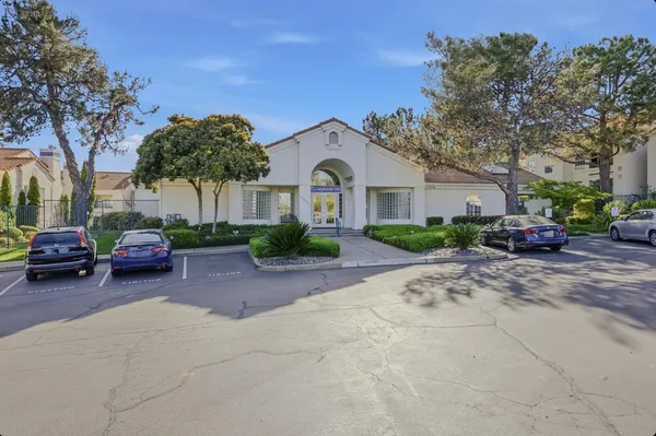 a car parked in front of a house