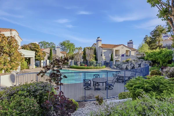 a view of a chairs and table in the terrace