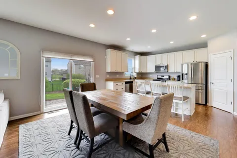a view of a dining room with furniture
